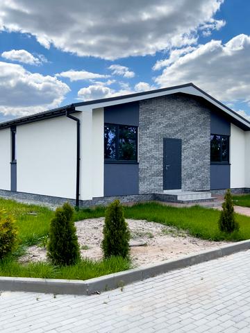 КМ Millennium House