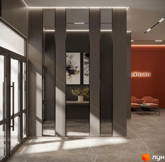 Сучасний вхід в житловий комплекс Mill Town з елегантним дизайном та освітленням. Просторий хол з арт-об'єктами та зонами відпочинку.