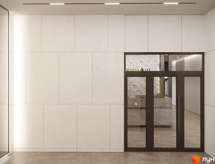 Зовнішній вигляд входу до житлового комплексу Mill Town з ресепшн та написом