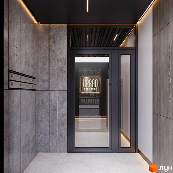 Вхідна група житлового комплексу URBAN Residence з сірими кам'яними панелями та дверима з логотипом. Поруч розташовані поштові скриньки.