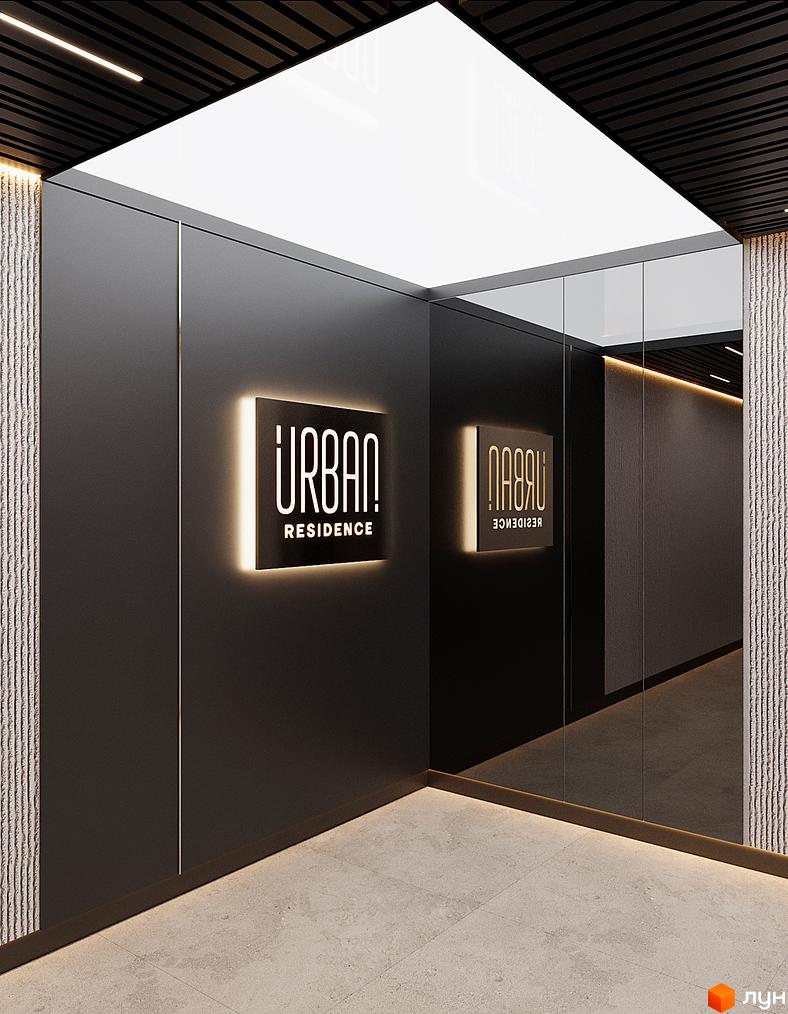 Зовнішній вигляд новобудови URBAN Residence з підсвіченою вивіскою. Відображення в дзеркальній поверхні створює враження простору.