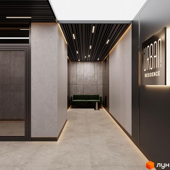 Вхідна група житлового комплексу URBAN Residence з м'яким диваном та освітленням.