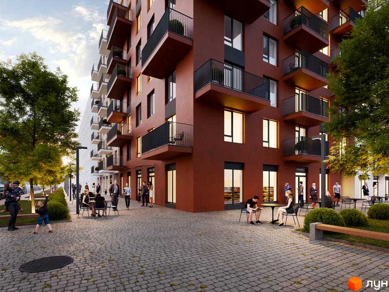 Житловий комплекс Київський з червоною фасадною частиною та балконами, прибудинкова територія з деревами та зонами відпочинку.