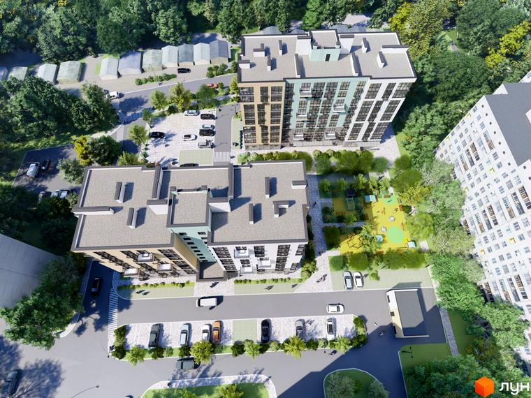 Житловий комплекс TWINS RESIDENCE з різнокольоровими фасадами та дитячим майданчиком на прибудинковій території.