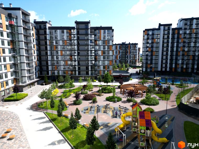 Житловий комплекс Атмосфера: фасади будівель з сірими та білими елементами, оранжевими вставками. Прибудинкова територія з дитячим майданчиком, зонами відпочинку та озелененням.