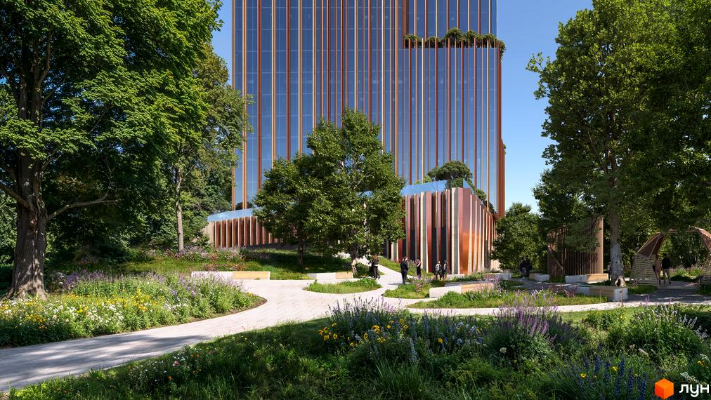 Житловий комплекс THE ONE з фасадом з вертикальних мідних та скляних елементів та доглянутою прибудинковою територією з квітами та деревами.