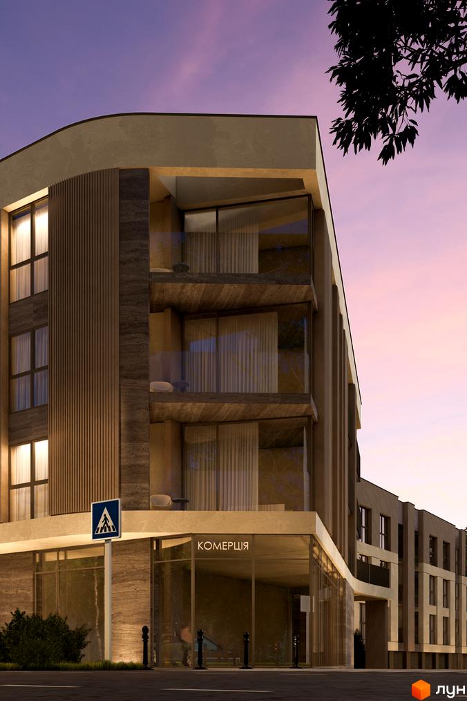 Фасад житлового комплексу Valencia з балконами та великими вікнами на тлі вечірнього неба. Зовнішній вигляд новобудови.