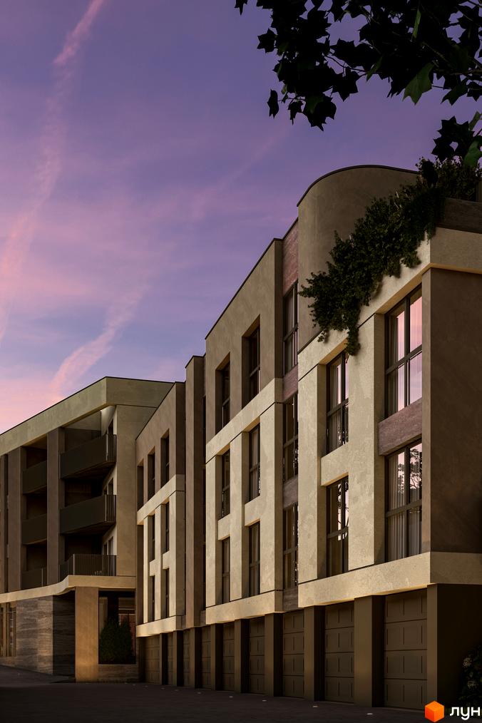 Зовнішній вигляд житлового комплексу Valencia з фасадами з бежевої штукатурки та великими вікнами на тлі вечірнього неба. На першому поверсі розташовані гаражні ворота.