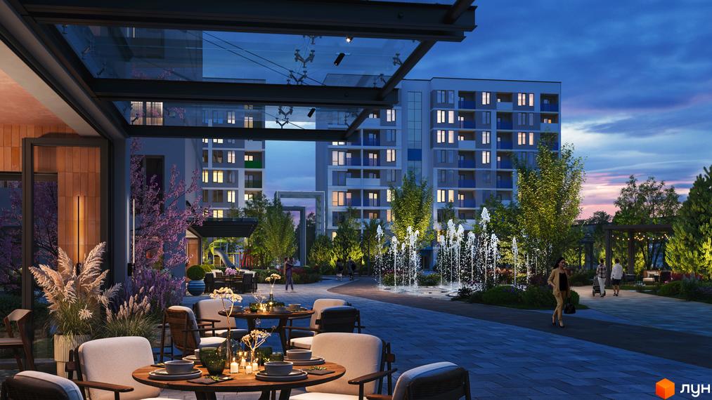 Житловий комплекс Литовський квартал: сучасні багатоповерхові будинки та затишна прибудинкова територія з фонтанами та зонами відпочинку.