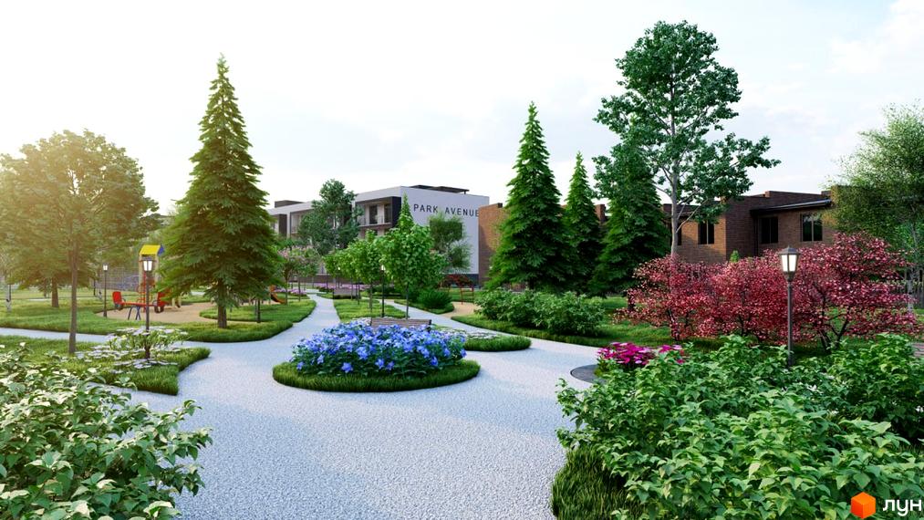 Житловий комплекс PARK AVENUE. Фасад будівлі з написом PARK AVENUE, зелена прибудинкова територія з дитячим майданчиком та квітами.
