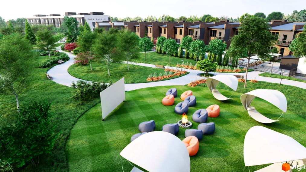 Житловий комплекс PARK AVENUE з доглянутою прибудинковою територією, зоною відпочинку з кріслами-мішками та кінотеатром просто неба.