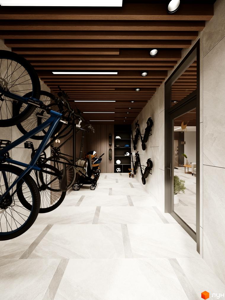 Просторий велопаркінг та дитячий транспорт у лобі житлового комплексу Kaiser Forest. Сучасна система зберігання для мешканців.