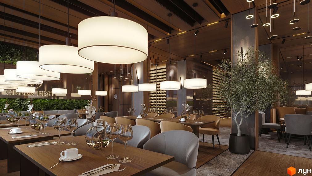 Інтер'єр ресторану Green Rest з великими білими світильниками та дерев'яними столами. Затишна атмосфера для відпочинку та трапези.