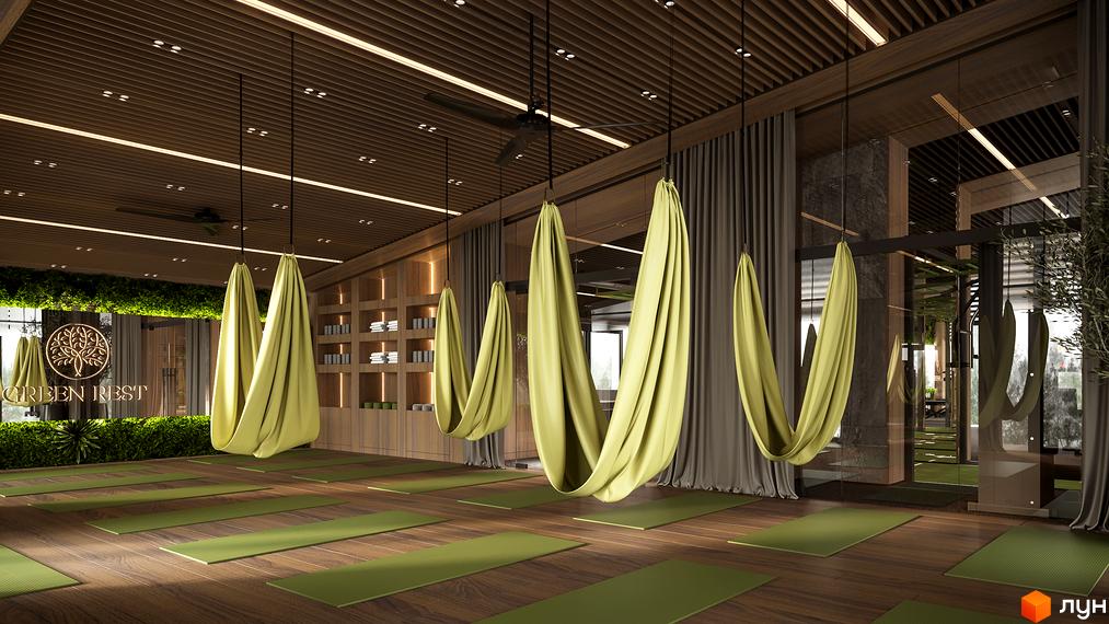 Зал для йоги в житловому комплексі Green Rest з гамаками та килимками. Сучасний дизайн інтер'єру з дерев'яними елементами та зеленню.