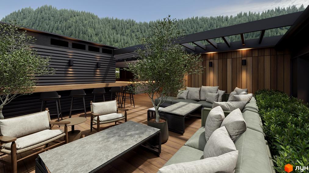 Тераса житлового комплексу Green Rest з диванами та баром на тлі лісистих гір. Відкритий простір для відпочинку та спілкування.