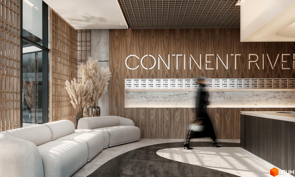 Лобі житлового комплексу CONTINENT RIVER PARK з диваном та поштовими скриньками. Дизайн інтер'єру з дерев'яними елементами та рослинами.