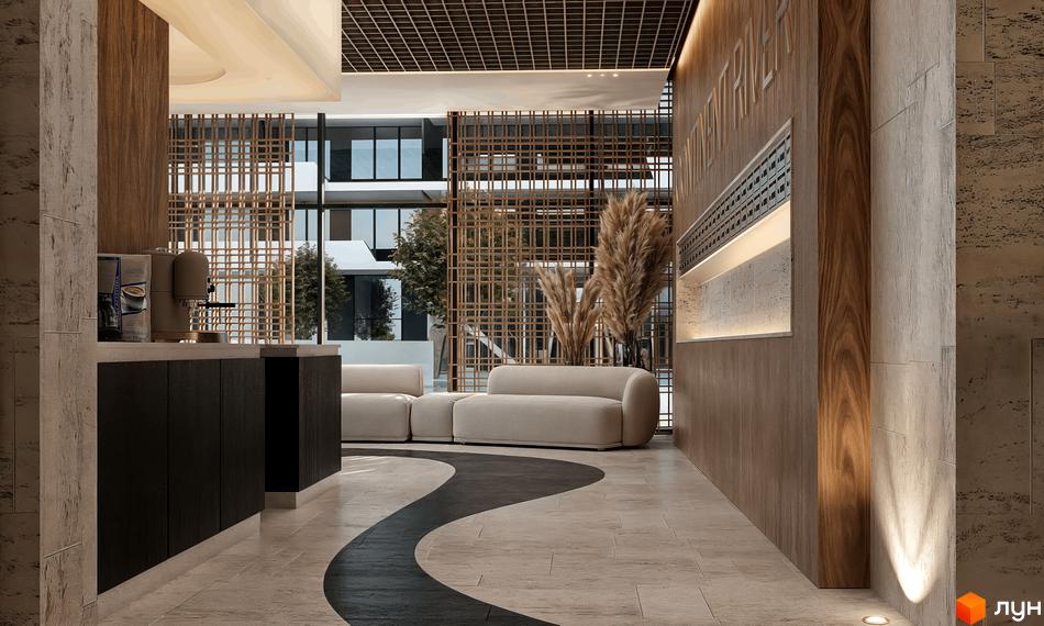 Лобі житлового комплексу CONTINENT RIVER PARK з диванами та кавомашиною. Сучасний дизайн інтер'єру з дерев'яними елементами та натуральними текстурами.