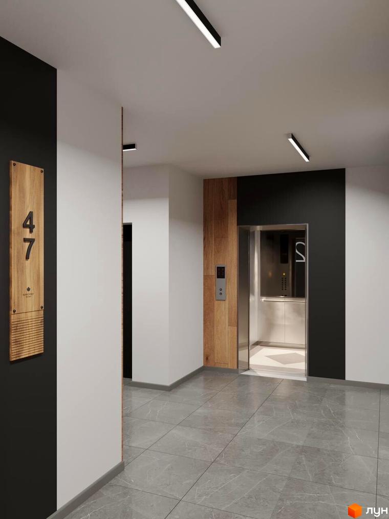 Сучасний хол житлового комплексу Кришталь з ліфтом та інформаційною табличкою.