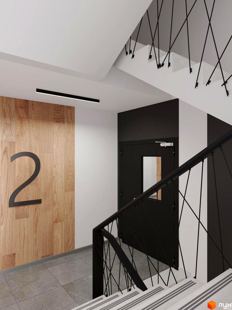 Сучасний дизайн сходової клітини в новобудові ЖК Кришталь з дерев'яними панелями та чорними поручнями. Відображення номеру поверху 