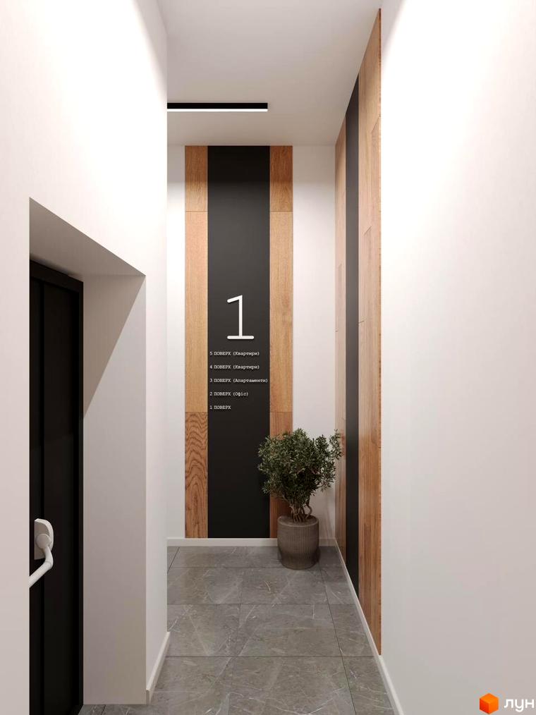 Інтер'єр першого поверху новобудови ЖК Кришталь з вказівником поверхів та елементами дизайну. Ознайомлення з плануванням квартир та офісів на кожному поверсі.