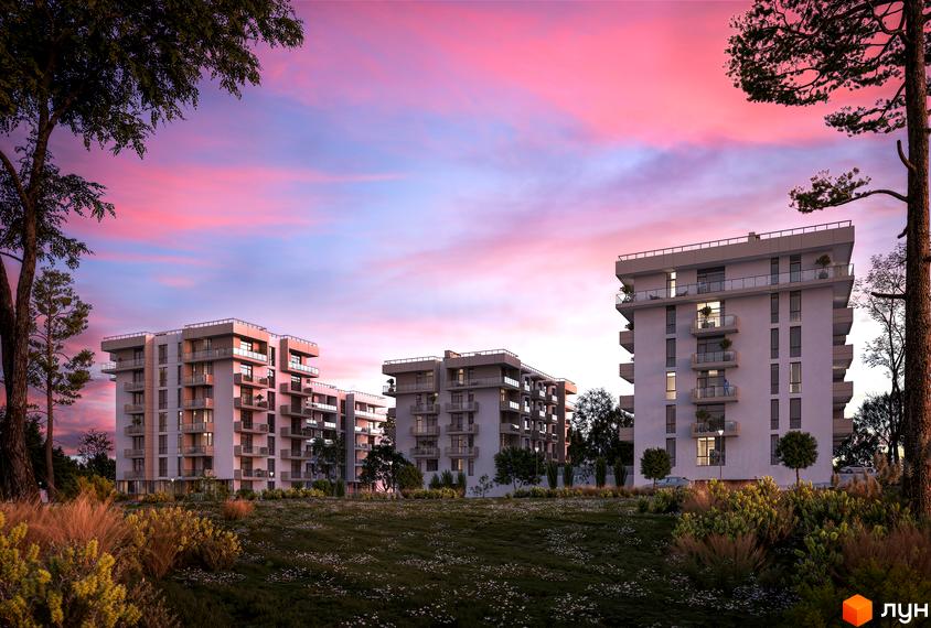 Житловий комплекс AUROOM LOUNGE з білими фасадами та балконами на тлі рожево-блакитного неба. Навколо комплексу зелена територія з деревами та кущами.