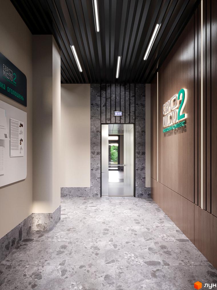 Житловий комплекс Євромісто 2. Сучасний вхід у новобудову з ліфтом та оздобленням з натуральних матеріалів.