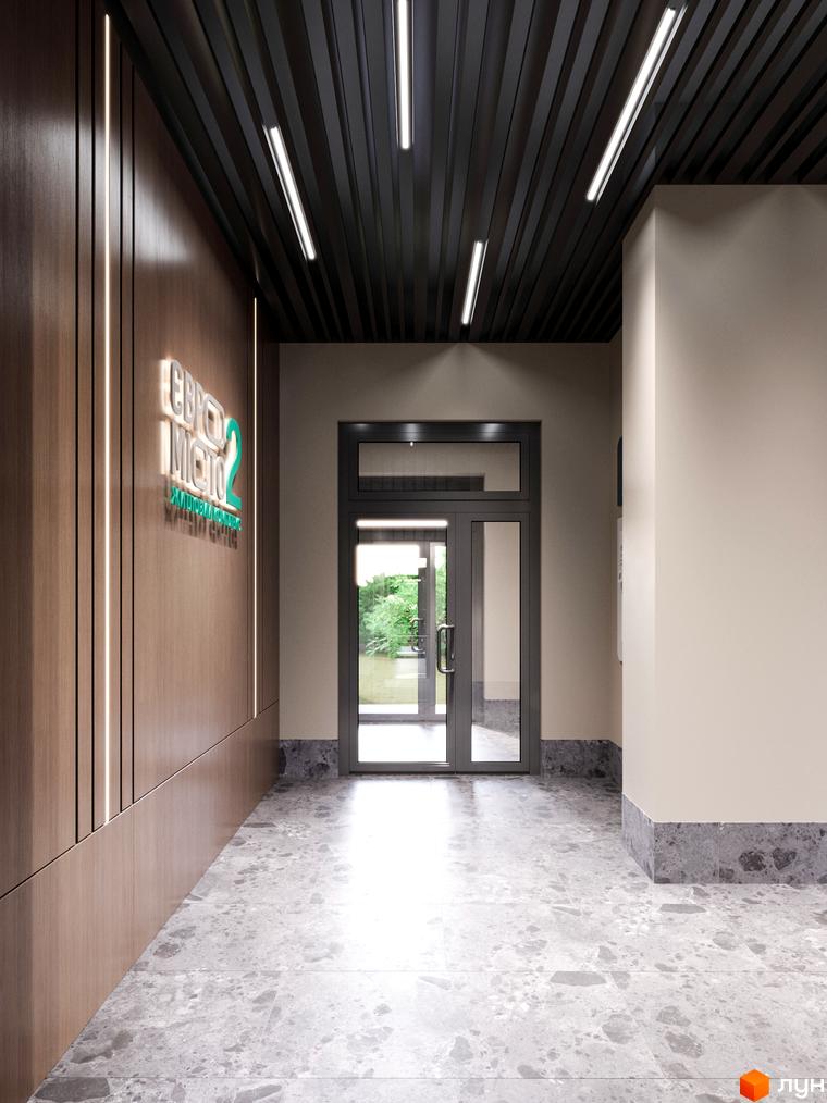 Вхідна група житлового комплексу Євромісто 2 з оздобленням стін під дерево та підлогою з мармурової плитки. Сучасний дизайн холу з підсвіткою.