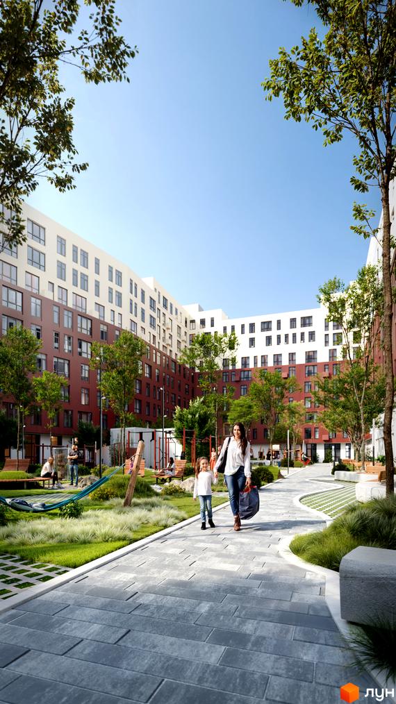 Новобудова Father з фасадами біло-бордового кольору та внутрішнім двором із зеленими зонами та дитячим майданчиком.