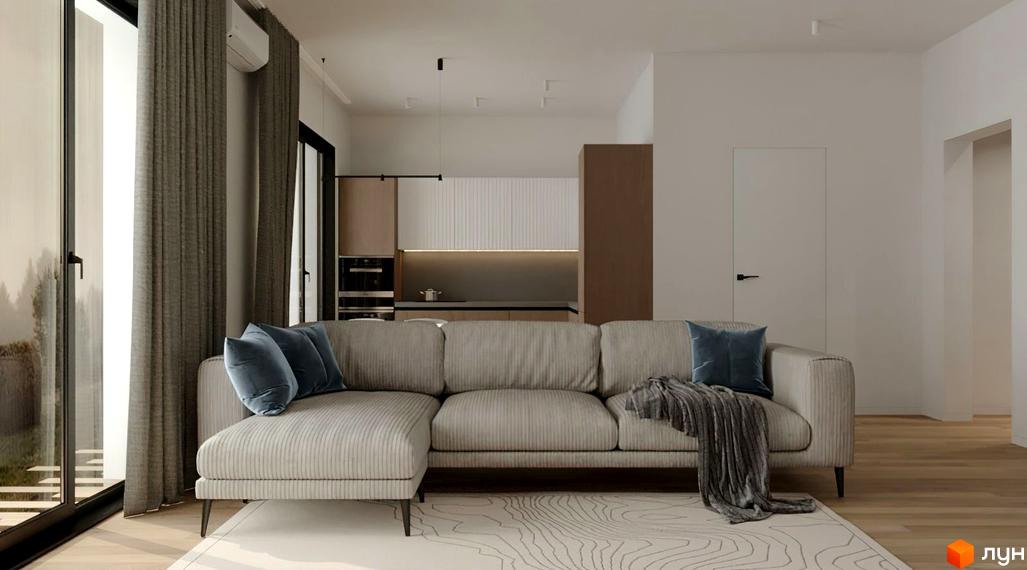 Інтер'єр вітальні з диваном та кухнею житлового комплексу КМ Kolibri. Простора вітальня з великими вікнами та сучасними меблями.