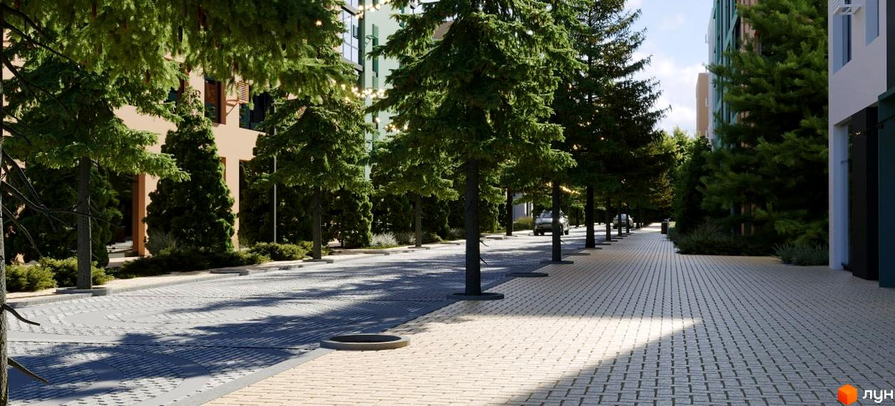 Житловий комплекс Хвоя: зелена вулиця з пішохідною зоною та будинками. Фото новобудови з деревами та бруківкою.