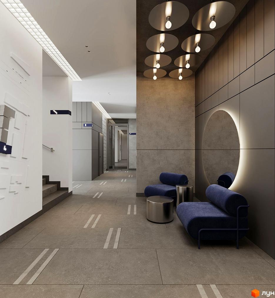 Лобі житлового комплексу Newton з диванами та дзеркалом. Сучасний дизайн інтер'єру новобудови.