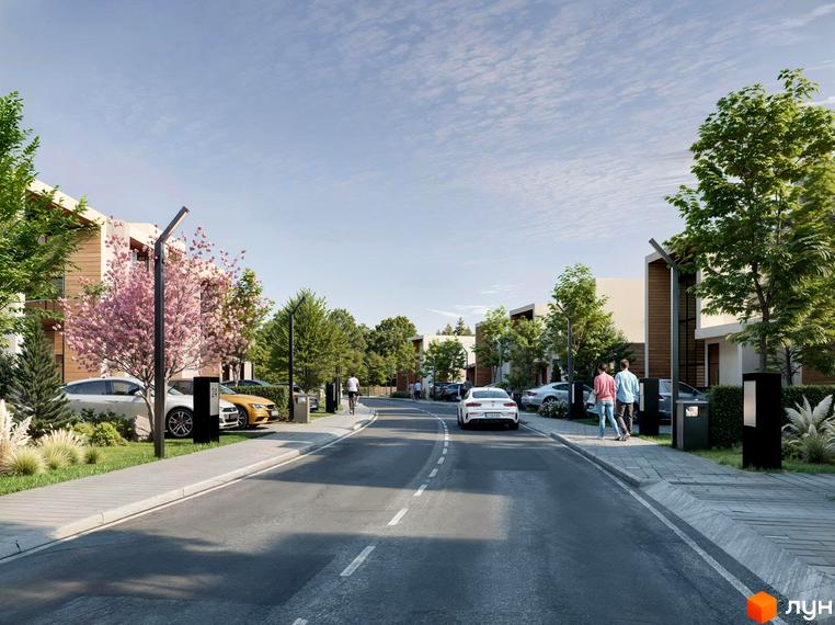 Котеджне містечко КМ Беверлі Хіллз DELUXE. Фото фасаду будинку та вулиці з прибудинковою територією, деревами та припаркованими авто.