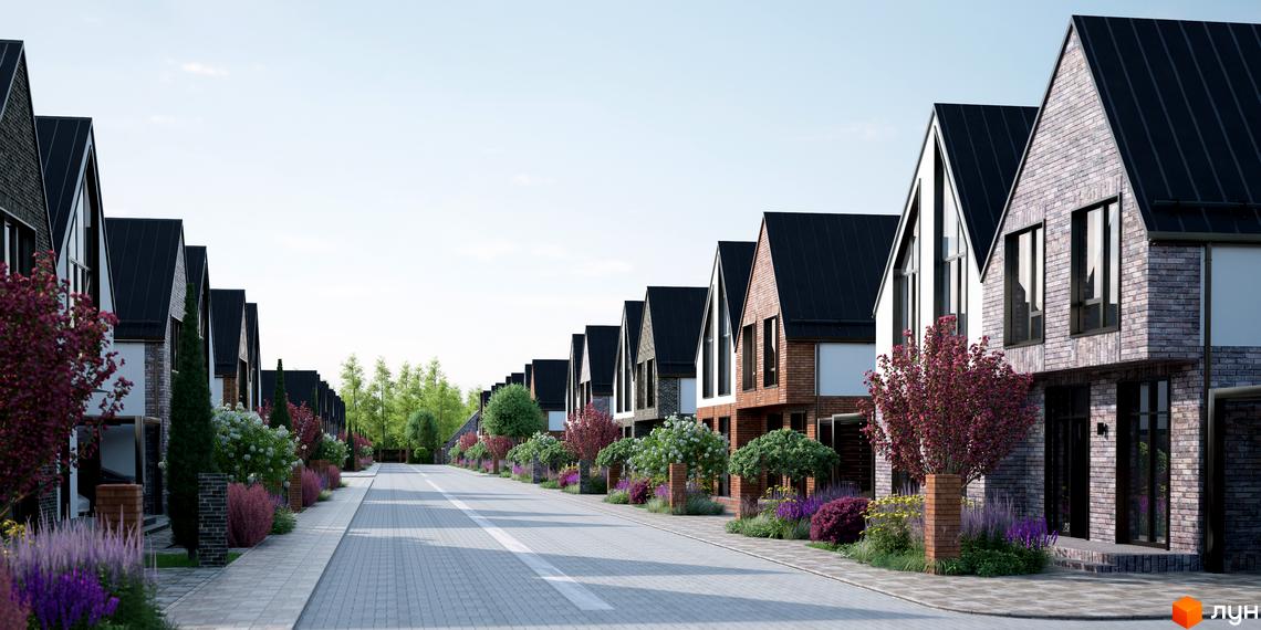 Котеджне містечко КМ ArtHomes: ряд цегляних будинків з темними дахами та озелененою вулицею. Зовнішній вигляд будинків та ландшафтний дизайн.