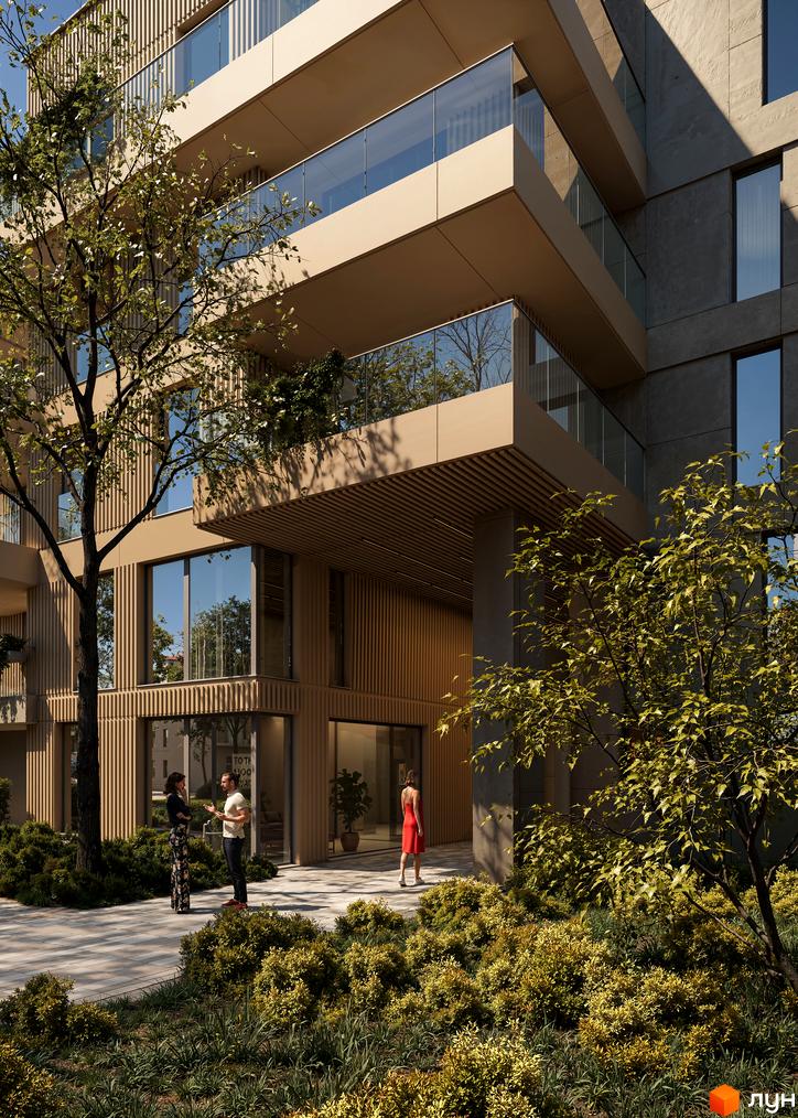 Житловий комплекс Bernard Gallery з балконами та скляними огорожами, оточений зеленню. На прибудинковій території розташовані дерева та кущі.