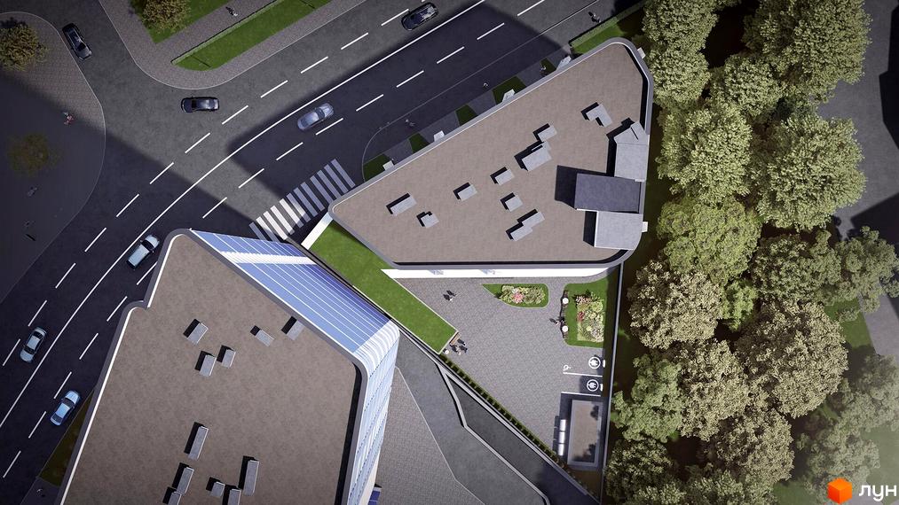 Житловий комплекс Канкріт з сонячними панелями на даху та доглянутою прибудинковою територією з деревами.