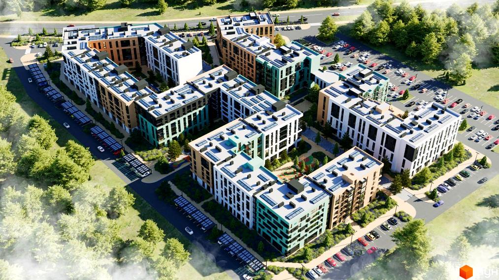 Житловий комплекс Хвоя з фасадами різних кольорів та сонячними панелями на даху. Навколо комплексу розташовані паркувальні місця та зелені насадження.