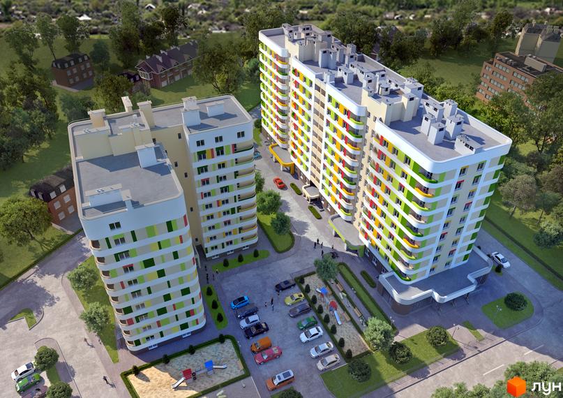 Вигляд з висоти на Житловий комплекс Чорновола. Багатоповерхові будинки з кольоровими балконами, дитячий майданчик, парковка та озеленена територія.