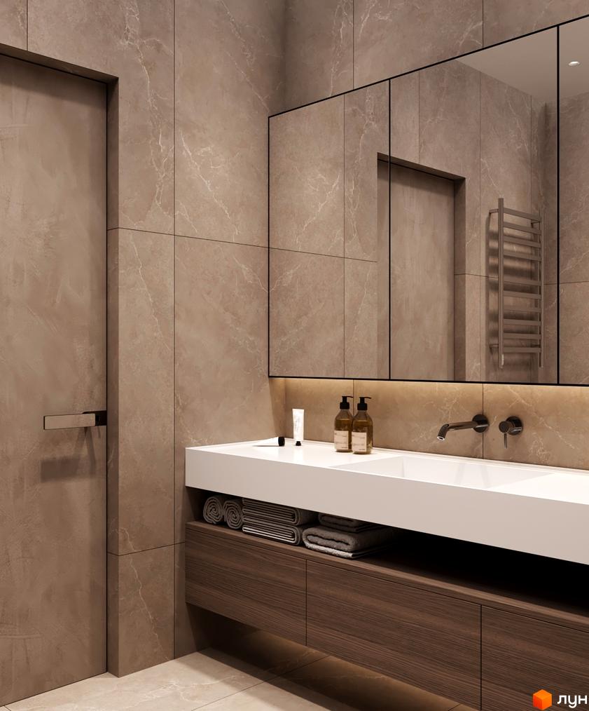Інтер'єр ванної кімнати в новобудові КМ NOA з мармуровим оздобленням та сучасною сантехнікою.