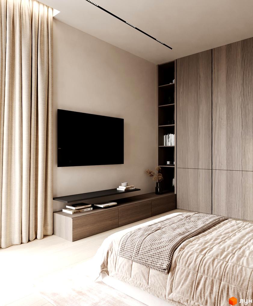 Інтер'єр спальні в житловому комплексі КМ NOA з телевізором, шафою та ліжком.