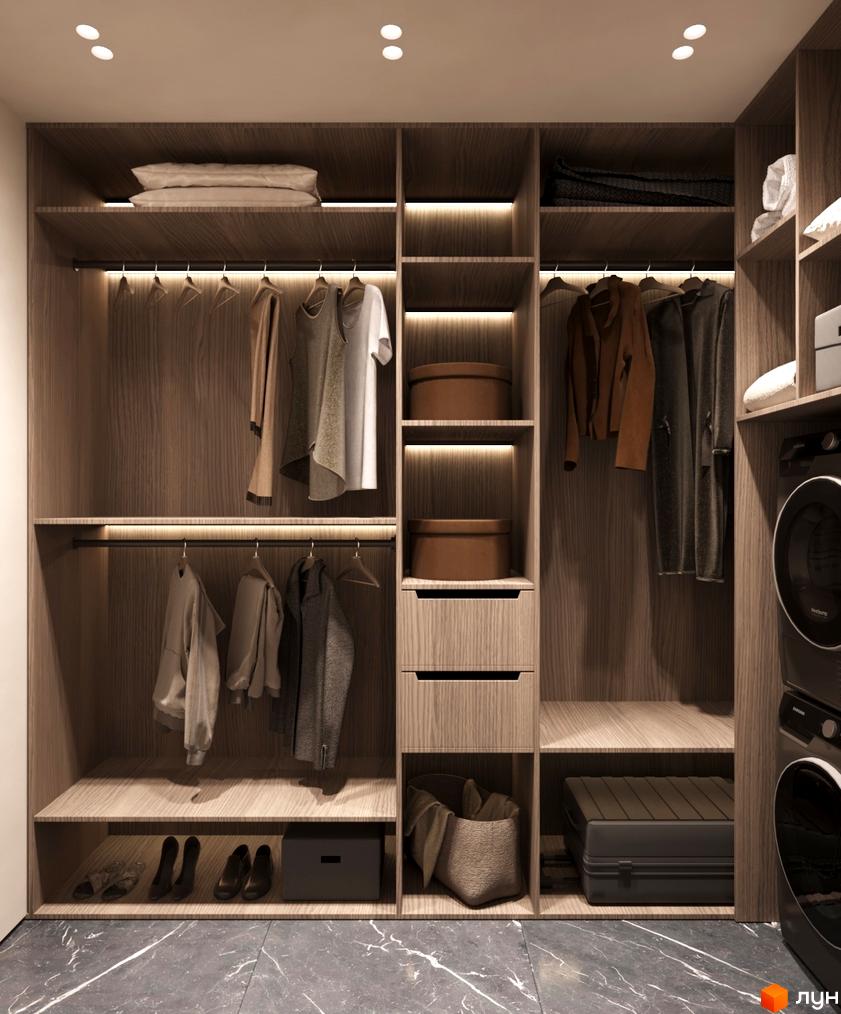 КМ NOA: просторий гардероб з дерев'яними фасадами, полицями для одягу та взуття, вбудованим освітленням та побутовою технікою.