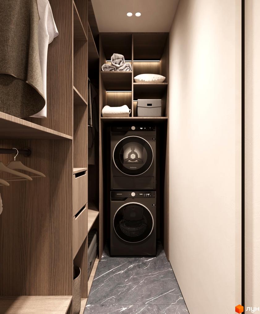 Вбудована шафа з пральною та сушильною машинами, полицями для зберігання рушників та одягу. КМ NOA – це сучасний житловий комплекс.