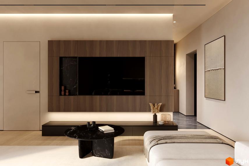 Інтер'єр вітальні в житловому комплексі КМ NOA з дерев'яною панеллю та кавовим столиком.