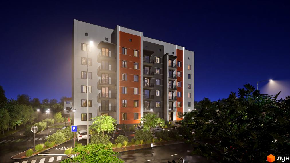 Зовнішній вигляд житлового комплексу Клубний Дім вночі з освітленими вікнами та балконами, навколо зелені насадження та парковка.