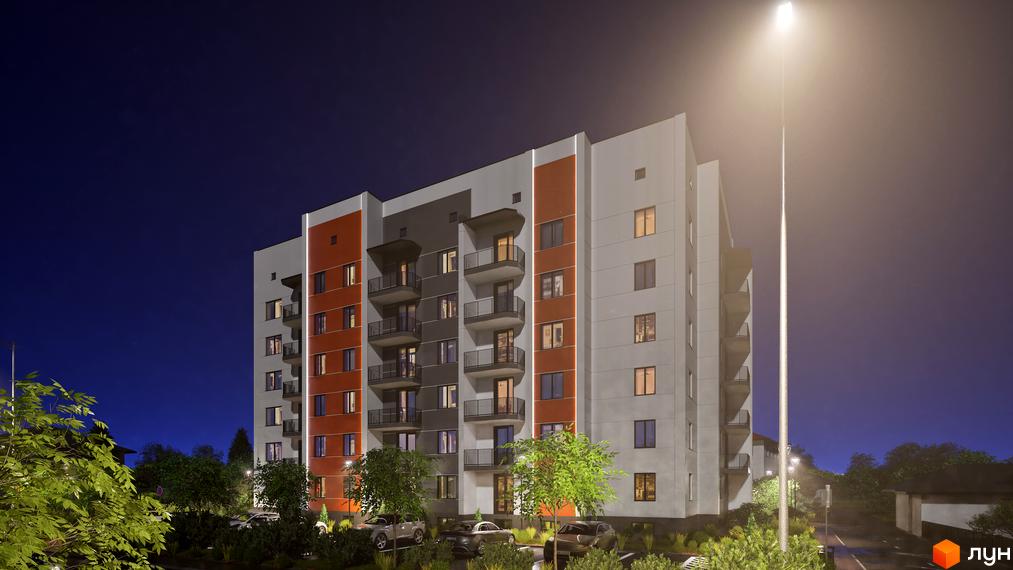 Житловий комплекс Клубний Дім вночі, з фасадами сірого та помаранчевого кольорів, балконами та освітленням. Навколо будинку зелені насадження та припарковані автомобілі.