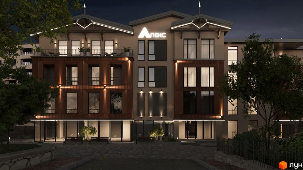 Апарт-готель Apex з цегляним фасадом та великими вікнами, освітлений вночі. Поруч розташовані лавки та дерева.