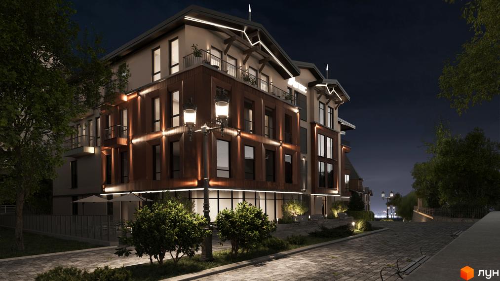 Апарт-готель Apex вночі з підсвіченим фасадом та прибудинковою територією з бруківкою та деревами.