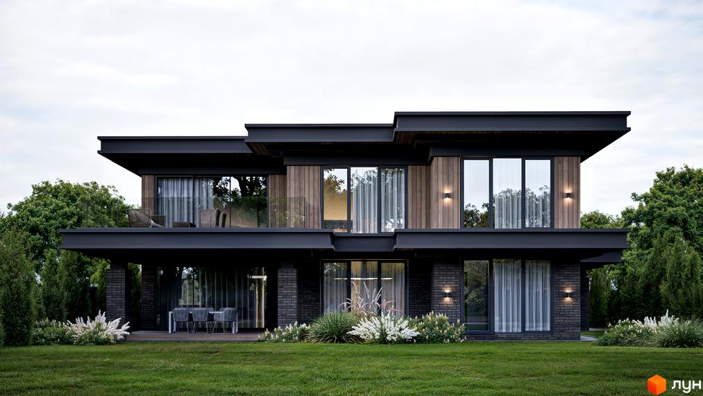 Котеджне містечко КМ Concept Villas - двоповерховий будинок з темними фасадами, дерев'яними вставками та великими вікнами, оточений зеленню та доглянутим газоном.