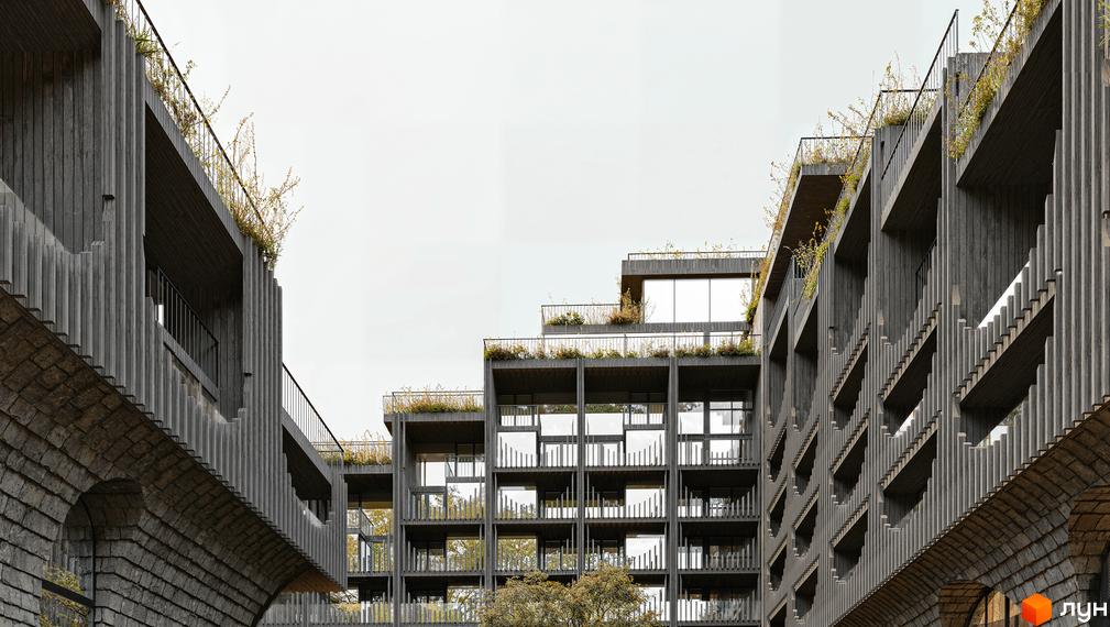 Фасад житлового комплексу Son Daven з терасами та зеленими насадженнями. Зовнішній вигляд новобудови з кам'яною кладкою та дерев'яними елементами.