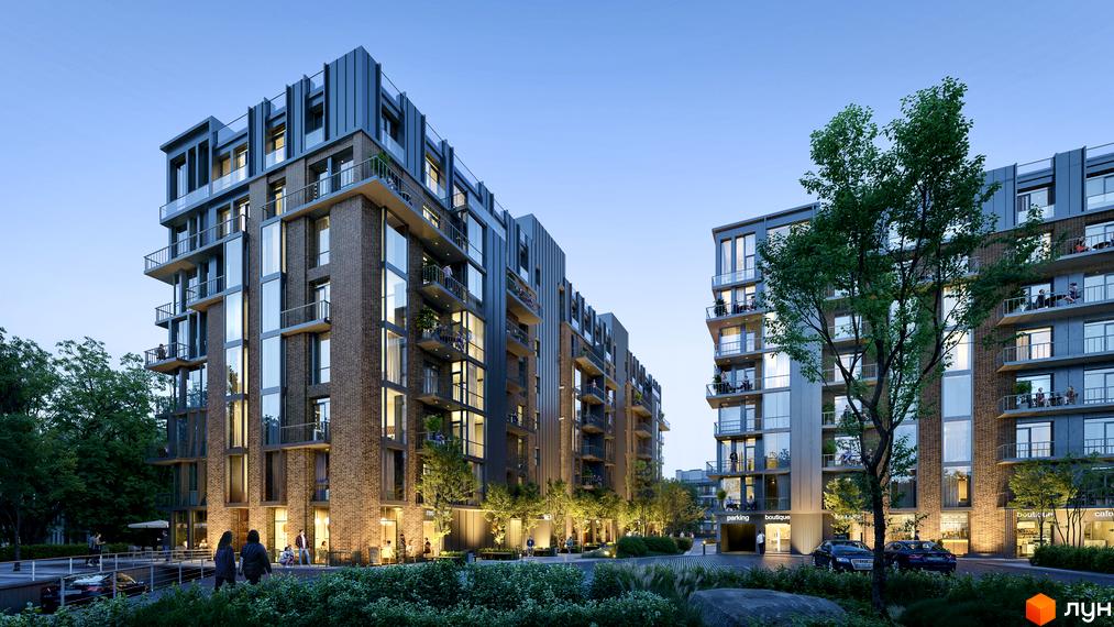 Зовнішній вигляд житлового комплексу Центр з цегляним фасадом, скляними балконами та прибудинковою територією з деревами та зонами відпочинку.