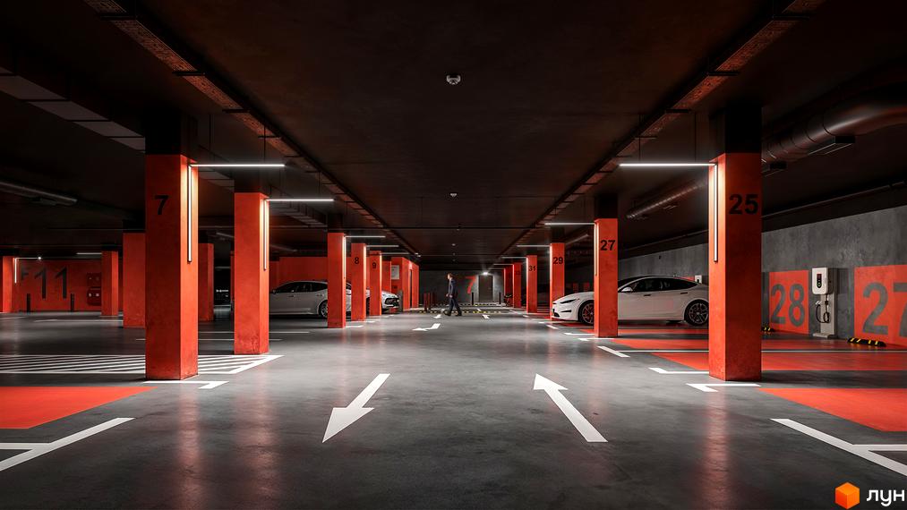 Підземний паркінг ЖК Центр з зарядними станціями для електромобілів та зручними паркувальними місцями. Сучасне освітлення та маркування забезпечують комфорт та безпеку.
